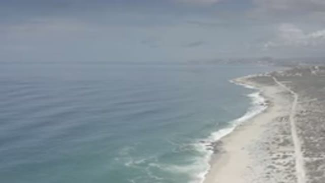 LOS CABOS MEXICO-2020: Under The Clear Sky Lies The Calm Blue Sea And Shore