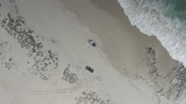 LOS CABOS MEXICO-2020: Almost Empty Beach With Two People Relaxing Near To A