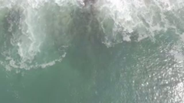 LOS CABOS MEXICO-2020: Breeze Taking Ocean Waves In And Out To Sea With Sun