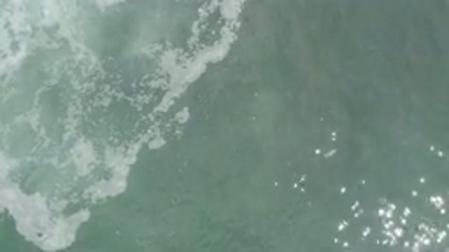 LOS CABOS MEXICO-2020: Ocean Tidal Waves With The Sun Reflecting On Its Surface
