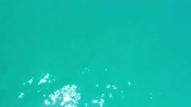LOS CABOS MEXICO-2020: Blue Water Slowly Lapping With Waves