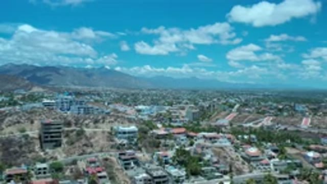 LOS CABOS MEXICO-2020: Mountain City Flown Over By Drone Near Mountains Under A