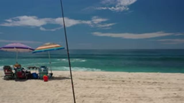 LOS CABOS MEXICO-2020: Two Beach Chairs And Umbrella On A Sandy Beach
