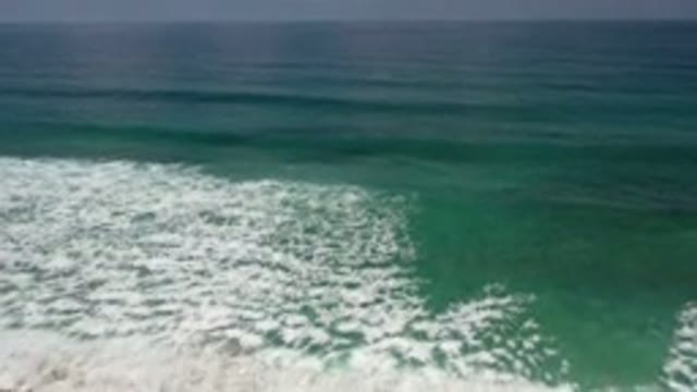 LOS CABOS MEXICO-2020: Green Sea With White Foams During A Warm Day