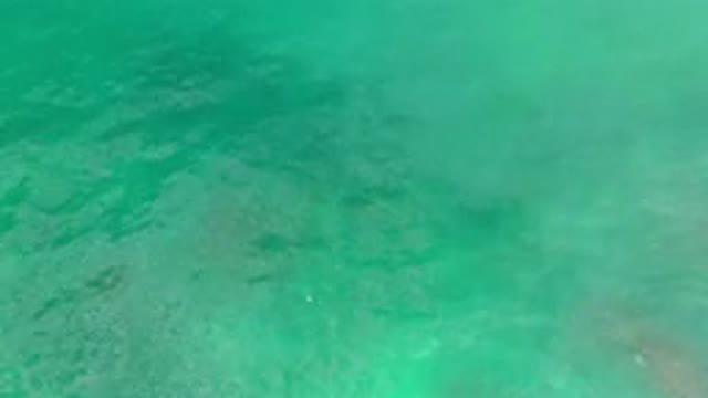 LOS CABOS MEXICO-2020: Calm Turquoise Waters Flowing From The Mouth Of A River