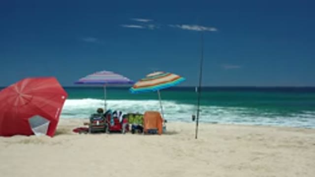 LOS CABOS MEXICO-2020: The Couple Is Sitting Near On The Beach And Taking Rest