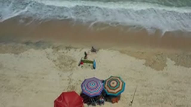 LOS CABOS MEXICO-2020: Children Playing Summer Games on Beach Ocean Sand