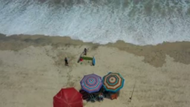 LOS CABOS MEXICO-2020: The Top Sew Of The Two Kids Playing In Beach Sand