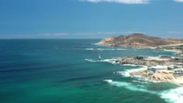 LOS CABOS MEXICO-2020: Ocean Waves Breaking Against The Rocks And Land With