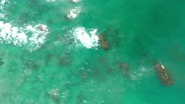 LOS CABOS MEXICO-2020: Waves Hitting Rocks And Reef In The Shallows Of An Unseen