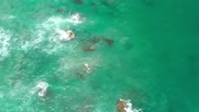 LOS CABOS MEXICO-2020: Sky View Of The Clean And Clear Ocean Waves With Sea Foam