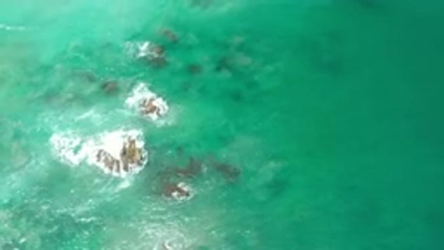 LOS CABOS MEXICO-2020: Overhead View Of Waves Crashing Over Rocks