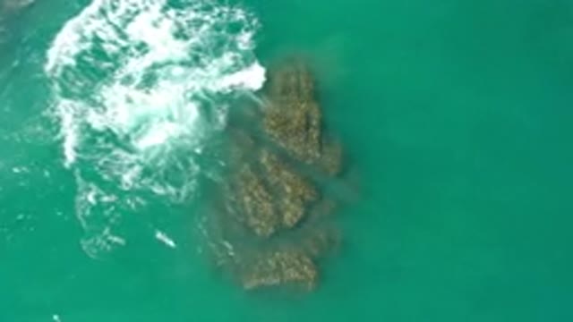 LOS CABOS MEXICO-2020: Top View Of Beach Rocks At The Middle Of The Beach