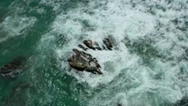 LOS CABOS MEXICO-2020: Waves Crashing Onto Water-Locked Rocks