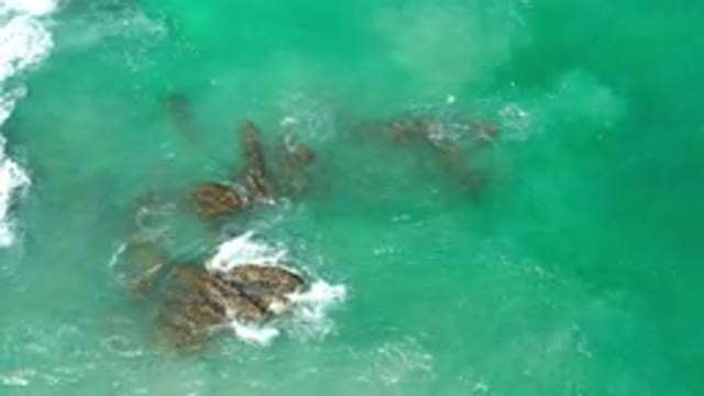 LOS CABOS MEXICO-2020: A Beautiful Beach With Rocks And Calm Waves The Kids Love