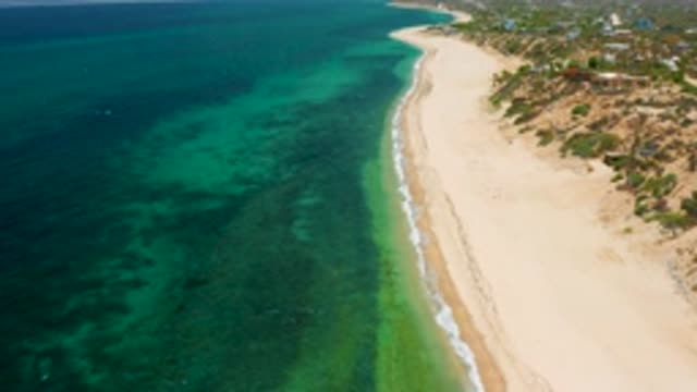 EL SARGENTO LA VENTANA MEXICO-2020: Ocean Waves Crashing On The Shores Of A Sandy Beach