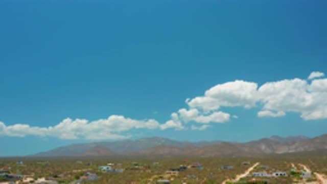 EL SARGENTO LA VENTANA MEXICO-2020: Clouds Moving Above The Mountains On A Sunny Day