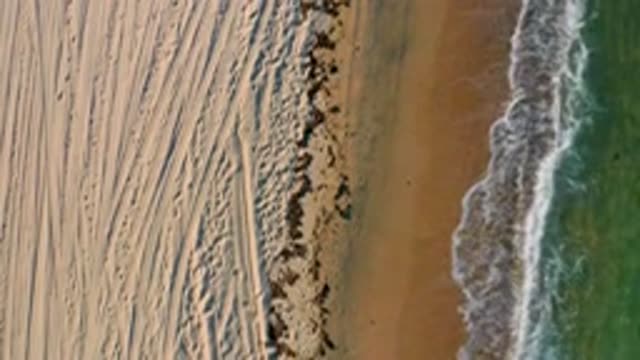 EL SARGENTO LA VENTANA MEXICO-2020: Ocean Tide Rolls In Toward Beige Sandy Beach