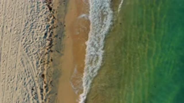 EL SARGENTO LA VENTANA MEXICO-2020: Water Crashing Onto The Shore Of A Lightly Populated Beach