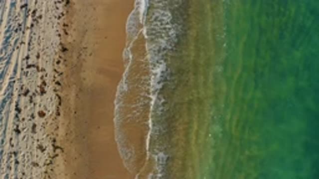 EL SARGENTO LA VENTANA MEXICO-2020: Waves Flowing Over An Empty Beach