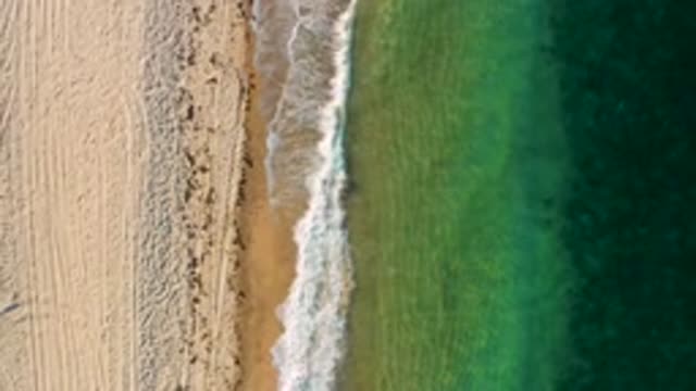 EL SARGENTO LA VENTANA MEXICO-2020: An Aerial View Of A Sandy Beach As Waves