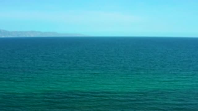 EL SARGENTO LA VENTANA MEXICO-2020: Blue Green Ocean Water With The Mountains In