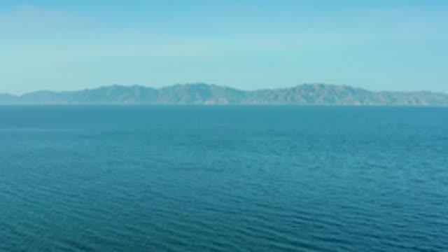 EL SARGENTO LA VENTANA MEXICO-2020: Mountains Residing In The Background Of A Calm Lake