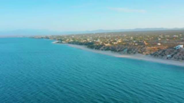 EL SARGENTO LA VENTANA MEXICO-2020: A Calm Ocean Beach With Homes Present