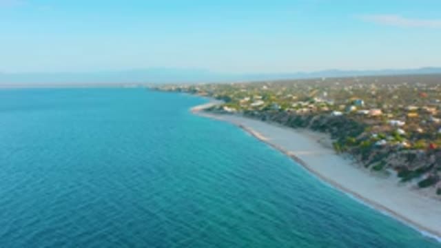 EL SARGENTO LA VENTANA MEXICO-2020: The Long View Of The Silent Blue Beach And Mountain Horizon