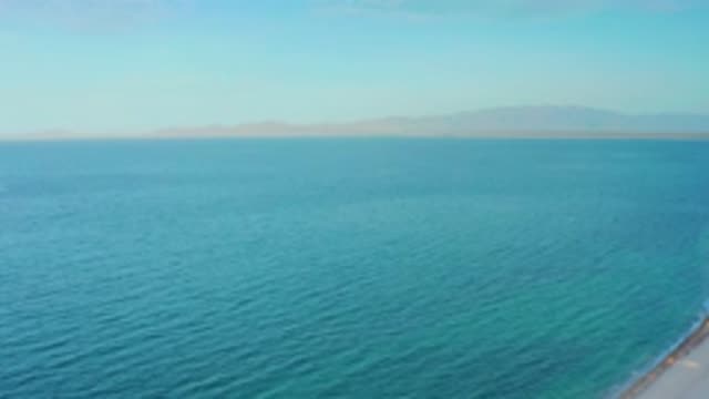 EL SARGENTO LA VENTANA MEXICO-2020: Aerial Shot Of Gently Blue Ocean Waves With