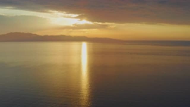 EL SARGENTO LA VENTANA MEXICO-2020: Sunset Behind Mountains And Over Calm Waters