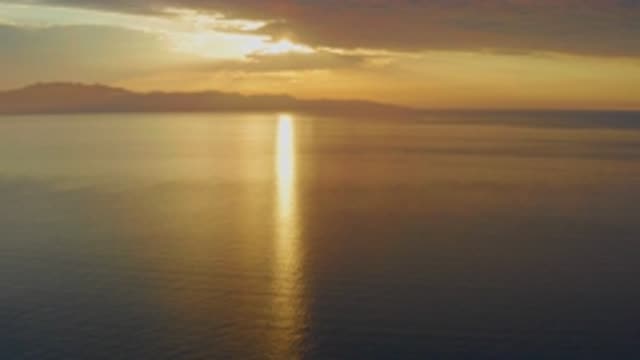 EL SARGENTO LA VENTANA MEXICO-2020: Sunset Over A Water As Still As Glass With Mountains