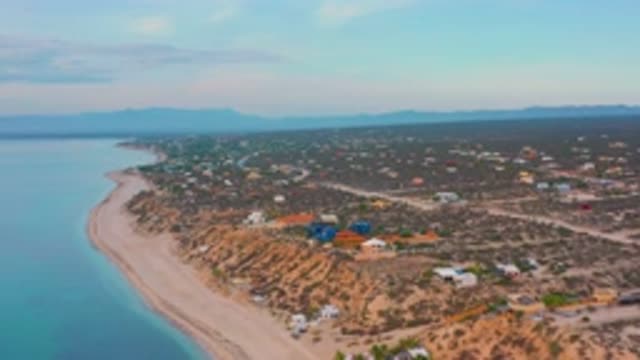 EL SARGENTO LA VENTANA MEXICO-2020: Blue And Brown Houses On Cliffside Ocean