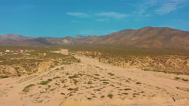 EL SARGENTO LA VENTANA MEXICO-2020: Desert Landscape Surrounded By Mountains And Plants