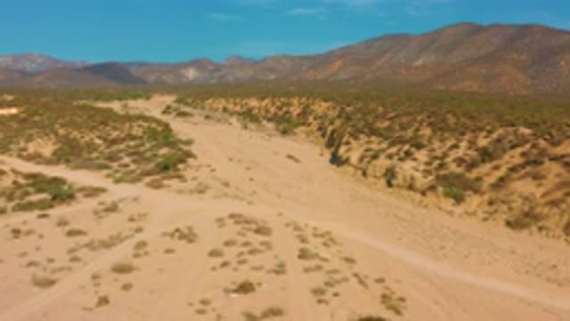 EL SARGENTO LA VENTANA MEXICO-2020: Sandy Roadway Leading To A Large Mountain