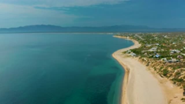 EL SARGENTO LA VENTANA MEXICO-2020: A High View Of A Shoreline With Sand And Blue Water