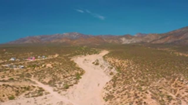 EL SARGENTO LA VENTANA MEXICO-2020: Desert Area With Shrubs And Mountains In The Background