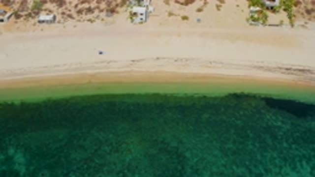 EL SARGENTO LA VENTANA MEXICO-2020: An Aerial Pan Of A Shoreline Featuring A