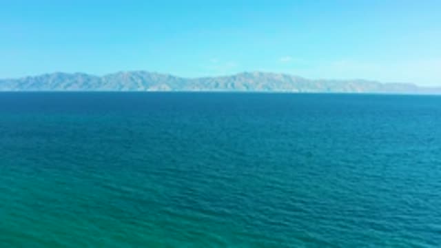 EL SARGENTO LA VENTANA MEXICO-2020: Drone Flying Over Clear Blue Sea Through