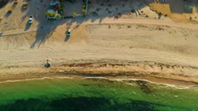 EL SARGENTO LA VENTANA MEXICO-2020: Calm Green Waves Wash Up On The Shore Of A