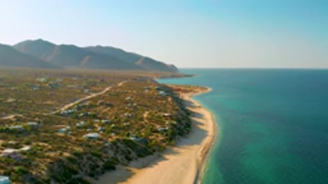 EL SARGENTO LA VENTANA MEXICO-2020: Blue Ocean Water Comes Ashore On A Sandy Beach