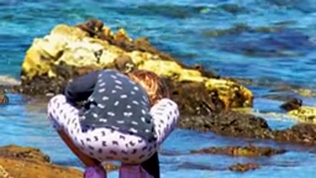 EL SARGENTO LA VENTANA MEXICO-2020: Girl Stopped On A Beach Near Jagged Rocks
