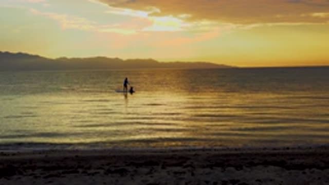 EL SARGENTO LA VENTANA MEXICO-2020: Woman Paddle Boarding Into A Beautiful Sunset