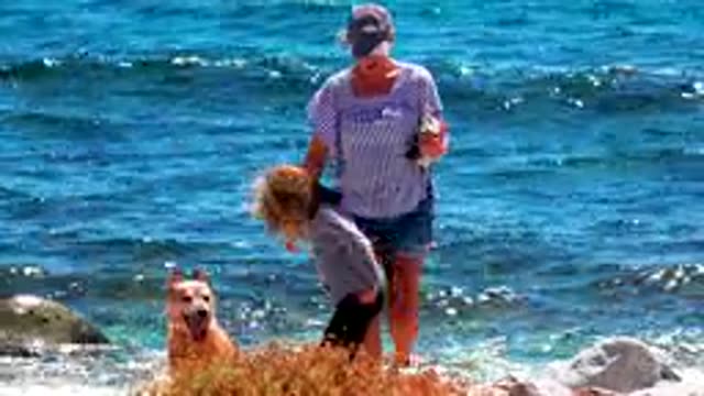 EL SARGENTO LA VENTANA MEXICO-2020: Mother And Daughter Walk Along A Rocky Beach