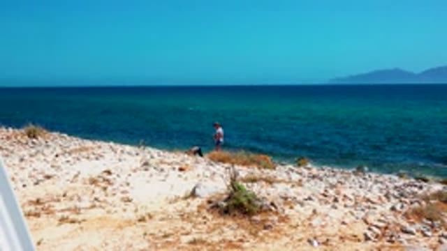 EL SARGENTO LA VENTANA MEXICO-2020: Two People Walking Around On The Beach With