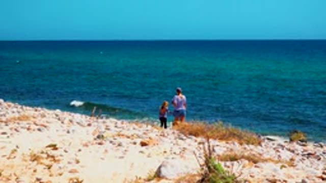 EL SARGENTO LA VENTANA MEXICO-2020: Shot Of Two People And Their Dog Walking