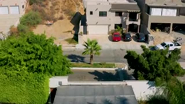 LOS CABOS MEXICO-2020: Panning Shot Of A Well Off City Neighborhood With Many