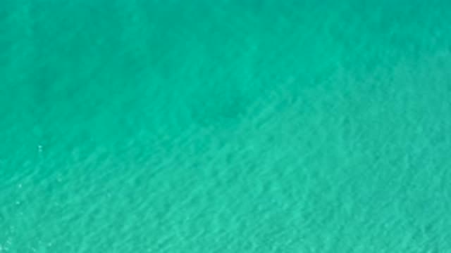 LOS CABOS MEXICO-2020: Small Waves Ripple Across The Surface Of Shallow Water