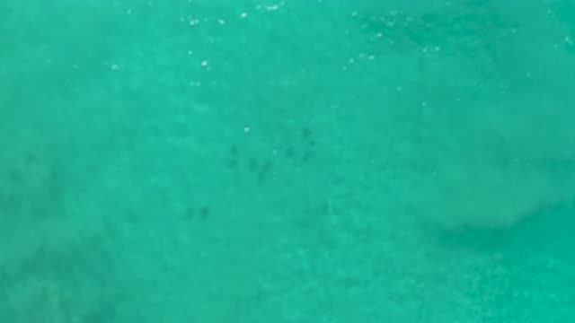 LOS CABOS MEXICO-2020: Drone Flying Over Clear Turquoise Blue Water While The