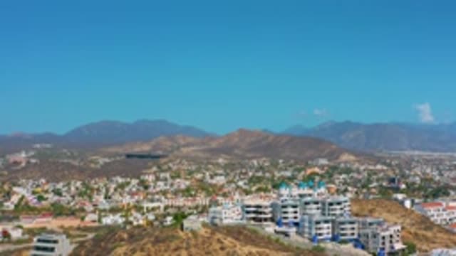 LOS CABOS MEXICO-2020: Panning Shot Of The City With A Beautiful Clean Sky Above